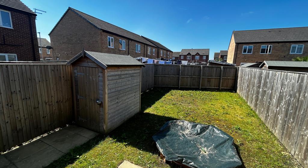 Image showing the rear garden and shed at 21 Aspen Court, Normanton.