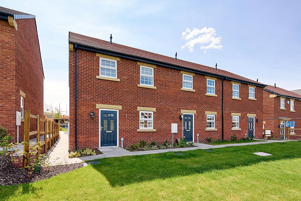 Image of the front of properties at Purston Grange, Featherstone.