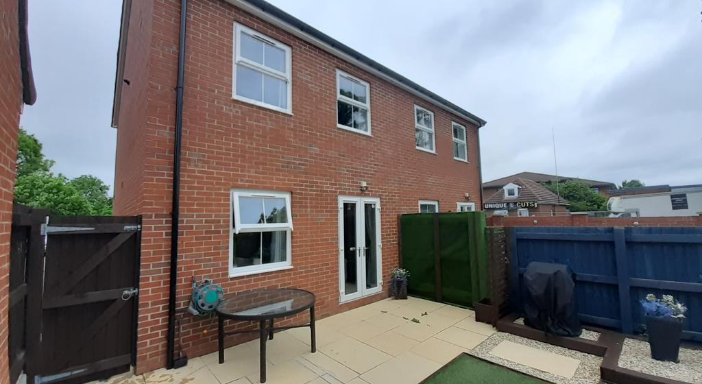 Image showing the rear of the property at 8 Field Gate Close, Wakefield.