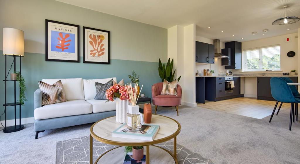 Image of a kitchen with an open plan living area.